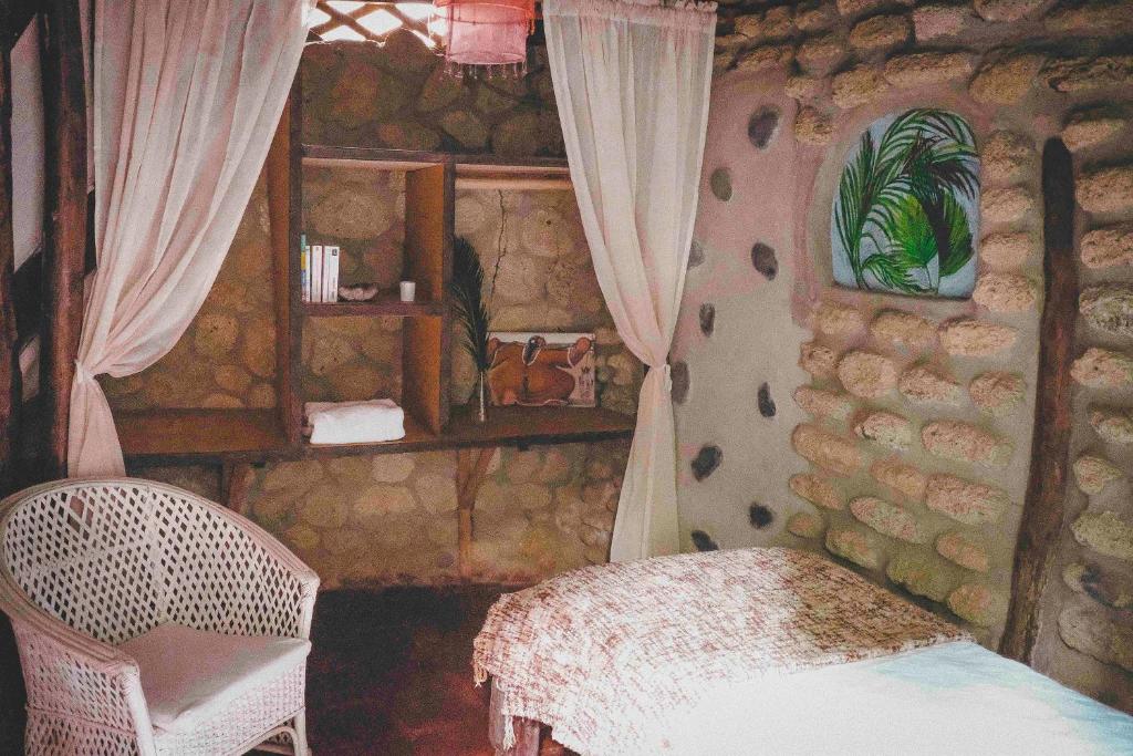 Postel nebo postele na pokoji v ubytování La Maison Eco House & Yoga