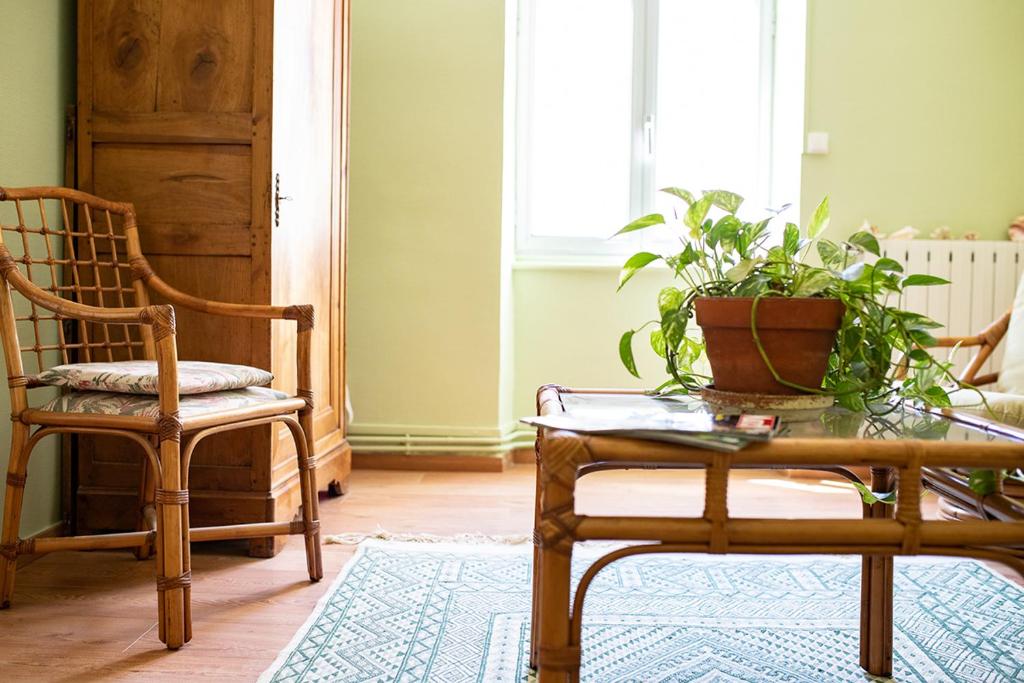 Posezení v ubytování L'écrin de l'Orb