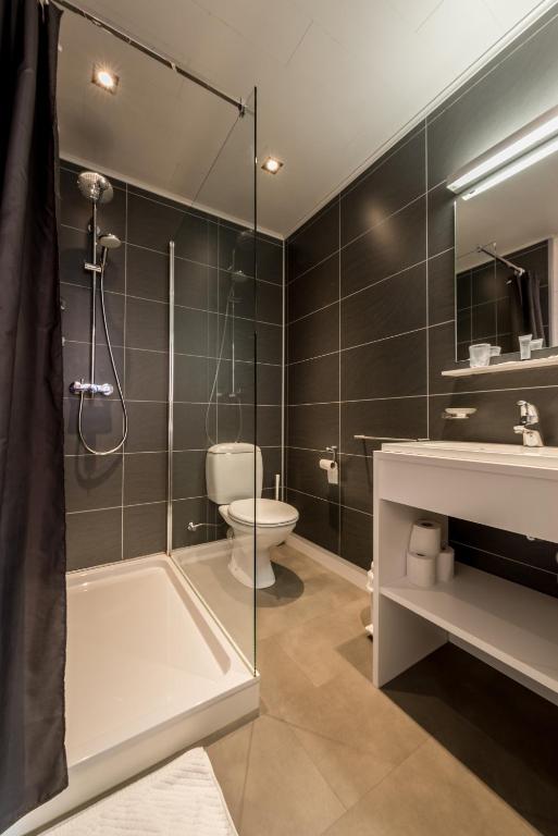Koupelna v ubytování Hotel Leopold