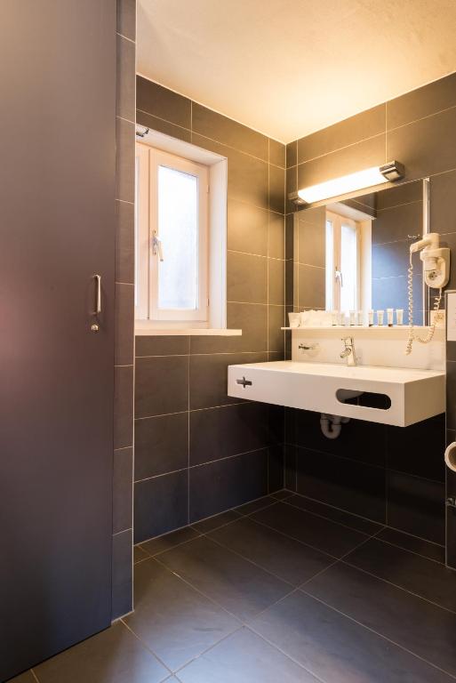 Koupelna v ubytování Hotel Leopold