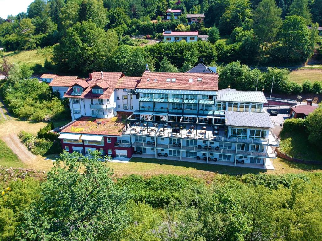 an aerial view of a large building on a hill at Hotel Spechtshaardt in Rothenbuch