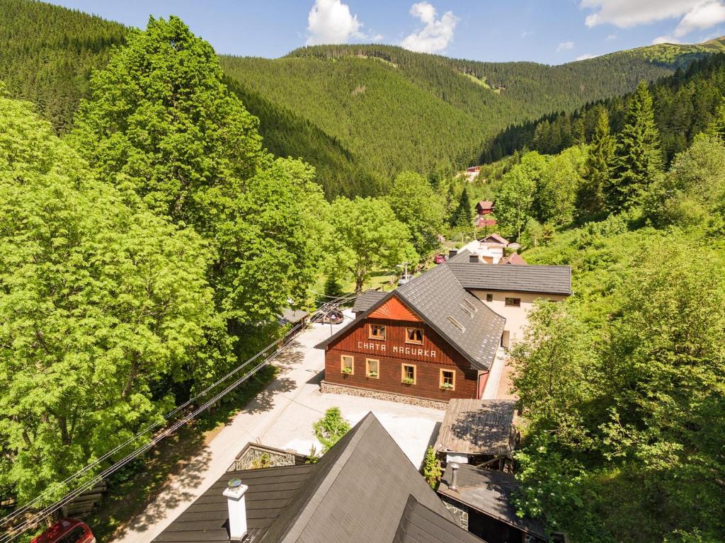 an aerial view of a house in the mountains at Chata Magurka in Partizánska ľupča