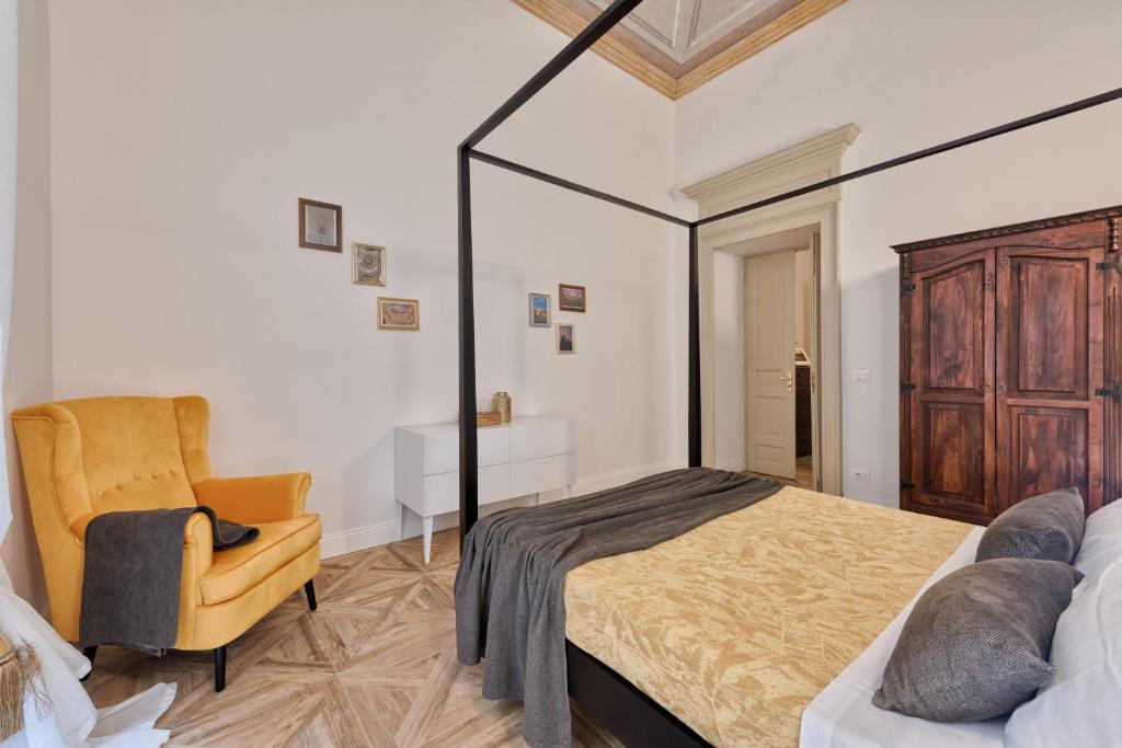 Łóżko lub łóżka w pokoju w obiekcie Apartments to Art