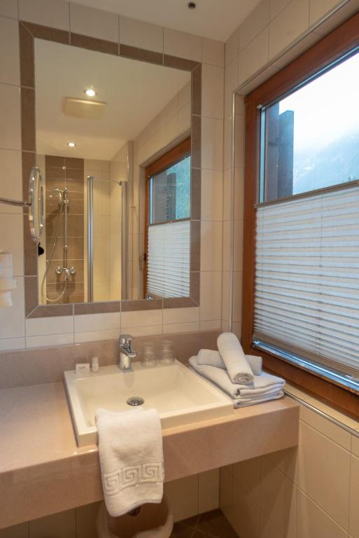 Koupelna v ubytování Alpenhotel Badmeister