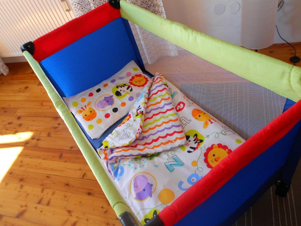 Postel nebo postele na pokoji v ubytování Ferienwohnung ALEX