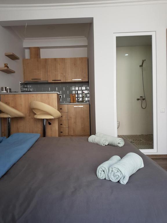 Cama o camas de una habitación en Cosy Apartment