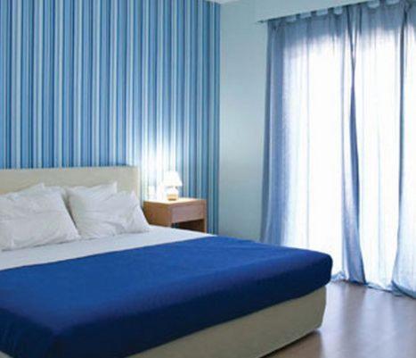 Postel nebo postele na pokoji v ubytování Valente Perlia Rooms