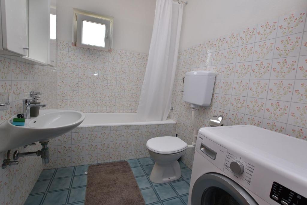Kúpeľňa v ubytovaní Apartments Jere Proto