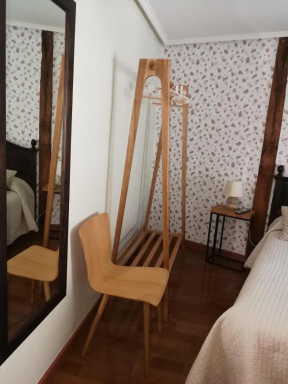 Posteľ alebo postele v izbe v ubytovaní Hostal El Resbalon