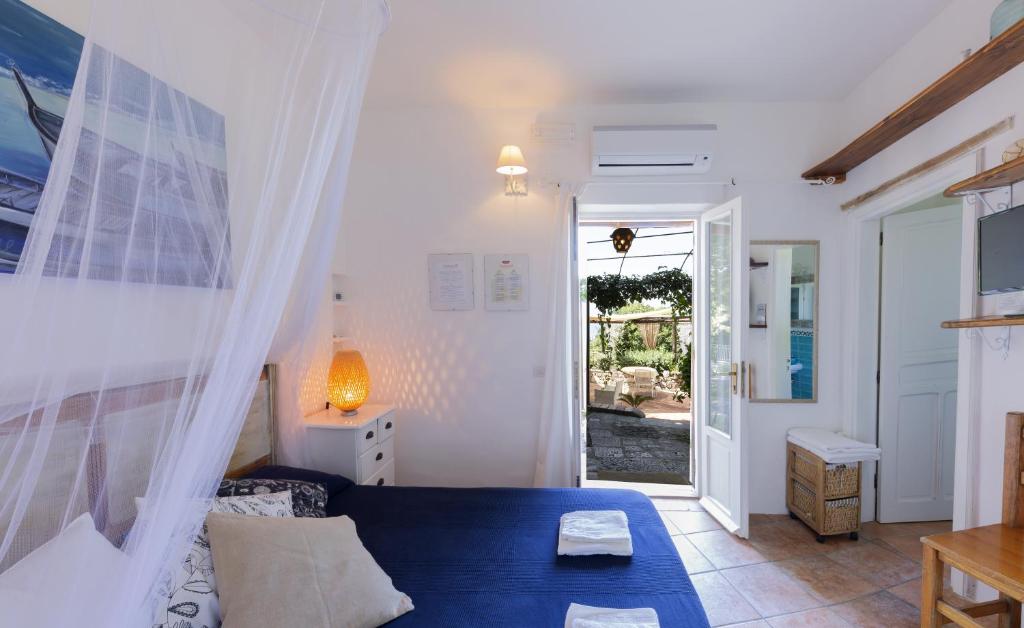 Postel nebo postele na pokoji v ubytování B&B Calandrella