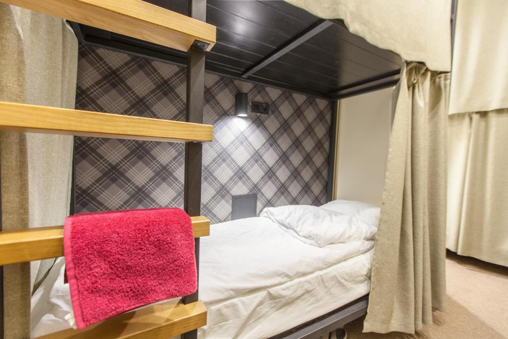 Postel nebo postele na pokoji v ubytování Nap & Rest Hostel