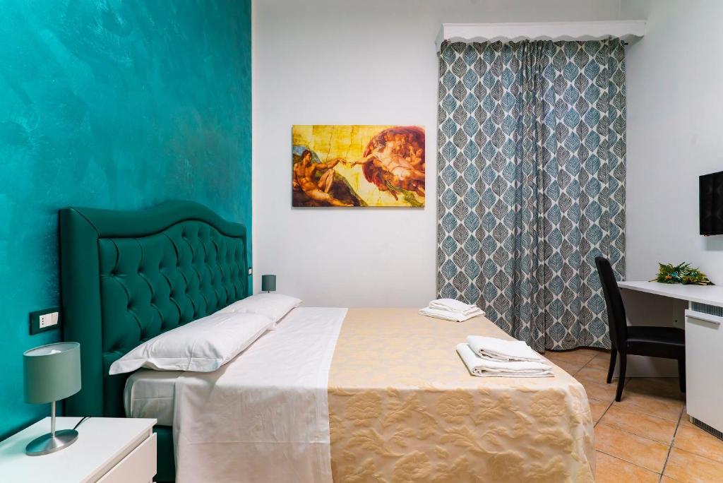 A bed or beds in a room at B&B La Cittadella