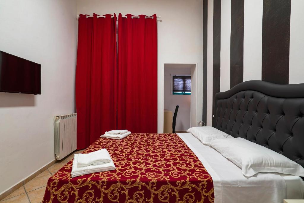 A bed or beds in a room at B&B La Cittadella