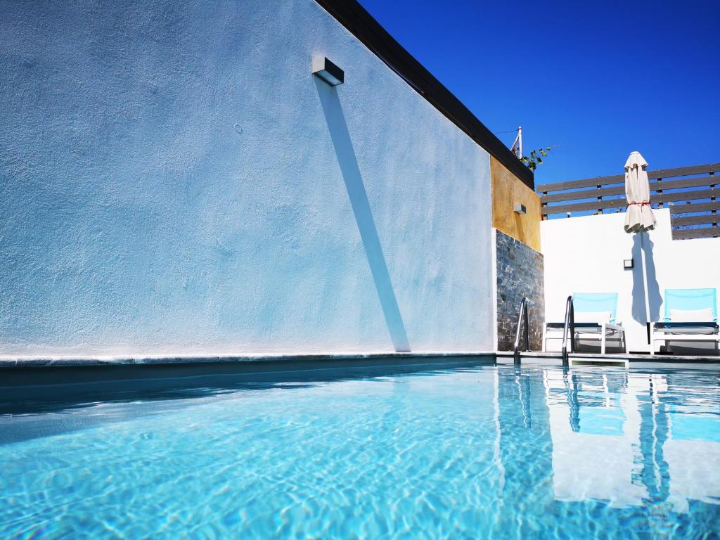 The swimming pool at or close to Villa Patroklos