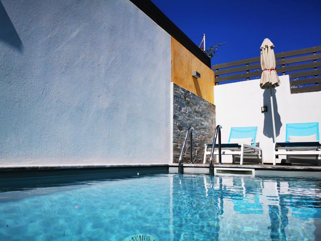The swimming pool at or close to Villa Patroklos