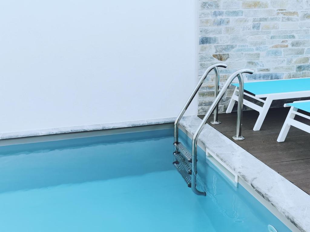 The swimming pool at or close to Villa Patroklos