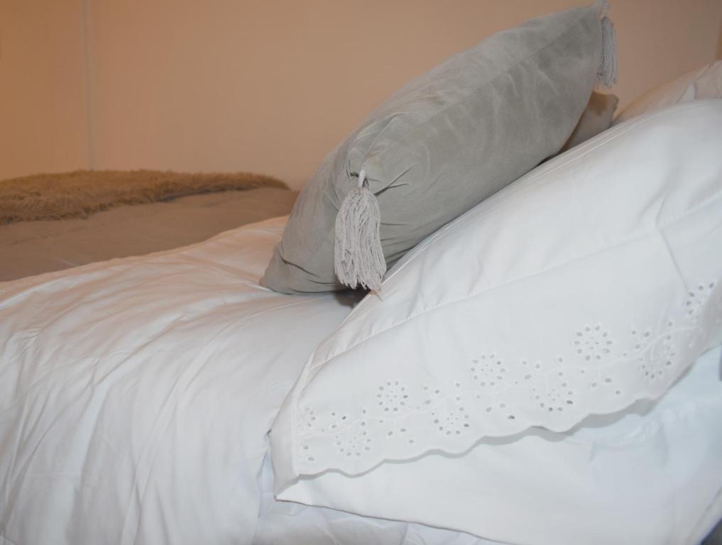 Un pat sau paturi într-o cameră la MaC Patagonia