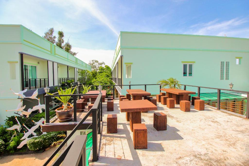 Balkón nebo terasa v ubytování Baan Noppadol Hua Hin Resort