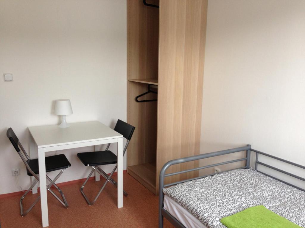 Postel nebo postele na pokoji v ubytování Hostel BOHEMIA