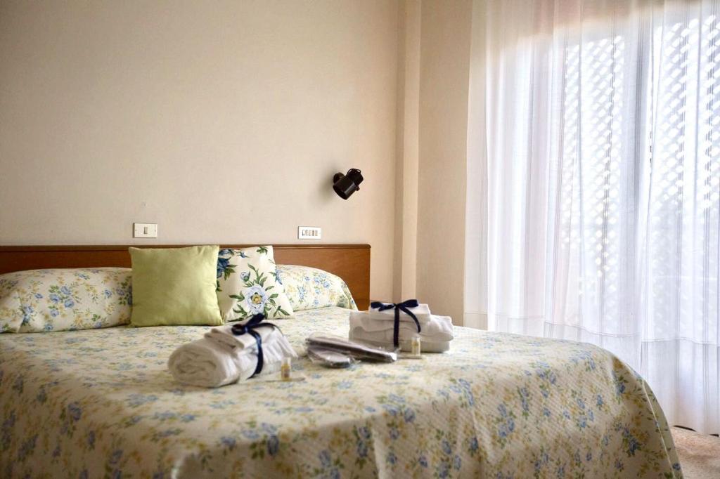 Postel nebo postele na pokoji v ubytování Albergo Le Sorgenti