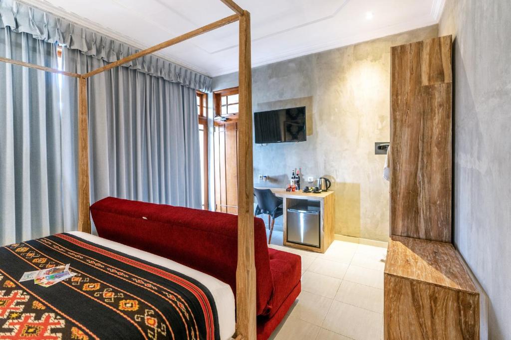 Кровать или кровати в номере 18 Suite Villa Loft at Kuta