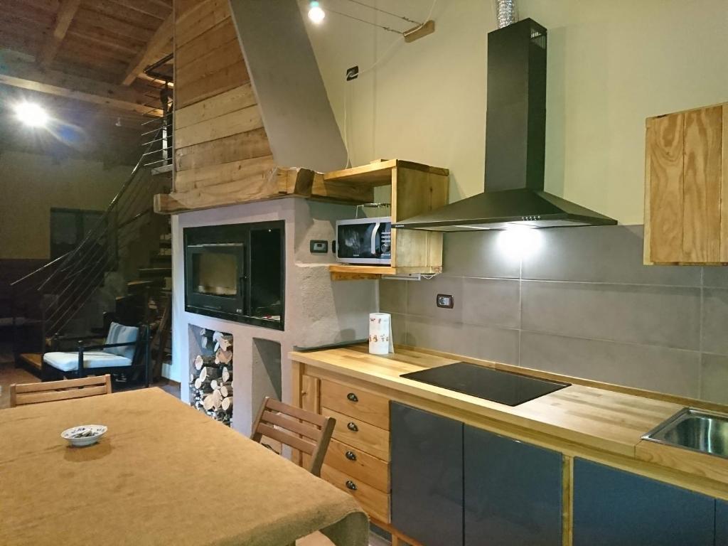 Kuchyň nebo kuchyňský kout v ubytování Chalet Morier