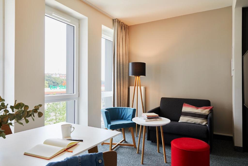Posezení v ubytování sylc. Apartmenthotel – Serviced Apartments
