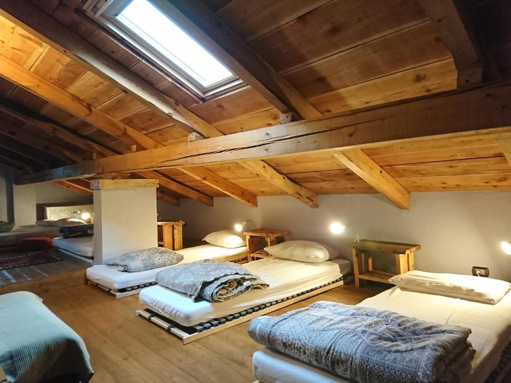 Postel nebo postele na pokoji v ubytování Chalet Morier