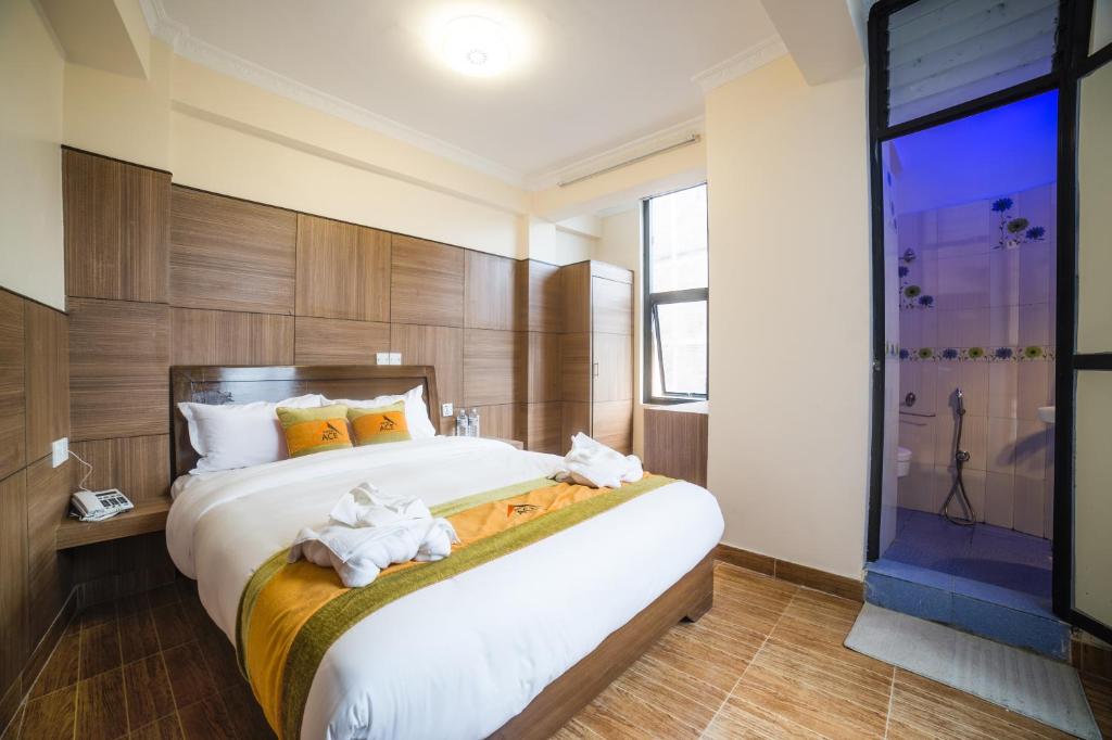 Cama o camas de una habitación en Hotel ACE