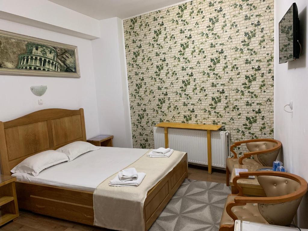 Postel nebo postele na pokoji v ubytování Hotel Funnytime
