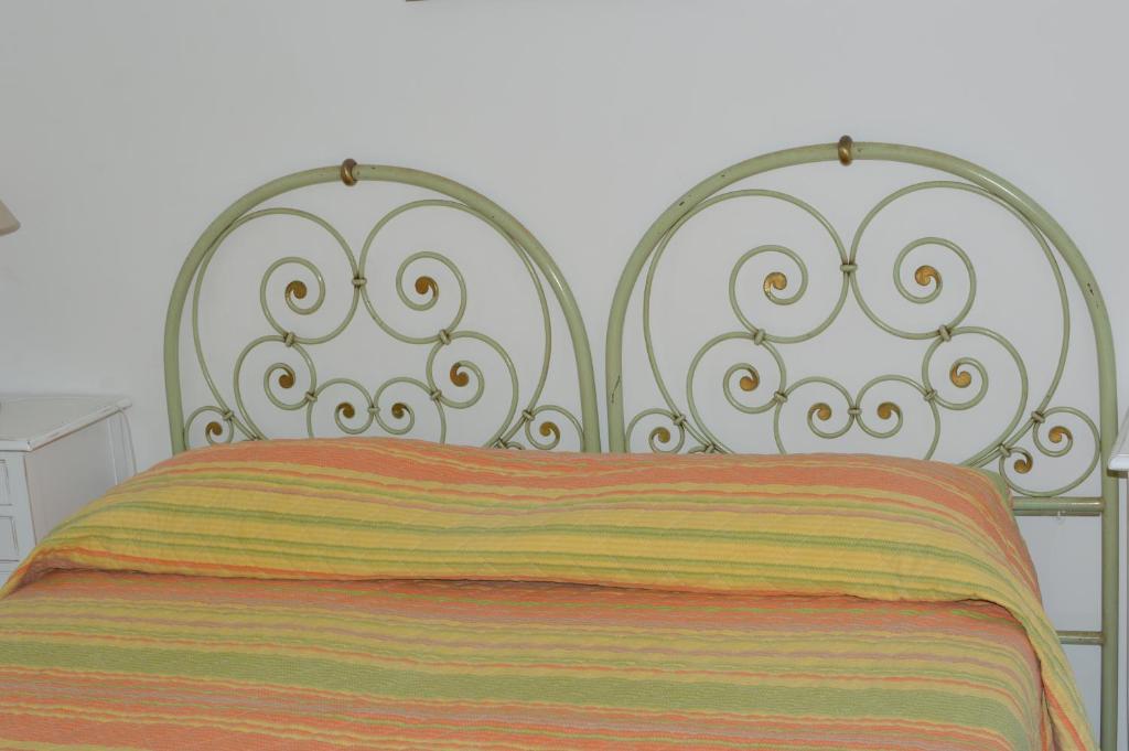 Postel nebo postele na pokoji v ubytování Hotel Polito