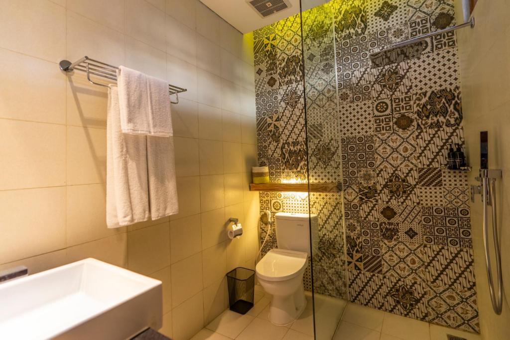 Ванная комната в 18 Suite Villa Loft at Kuta
