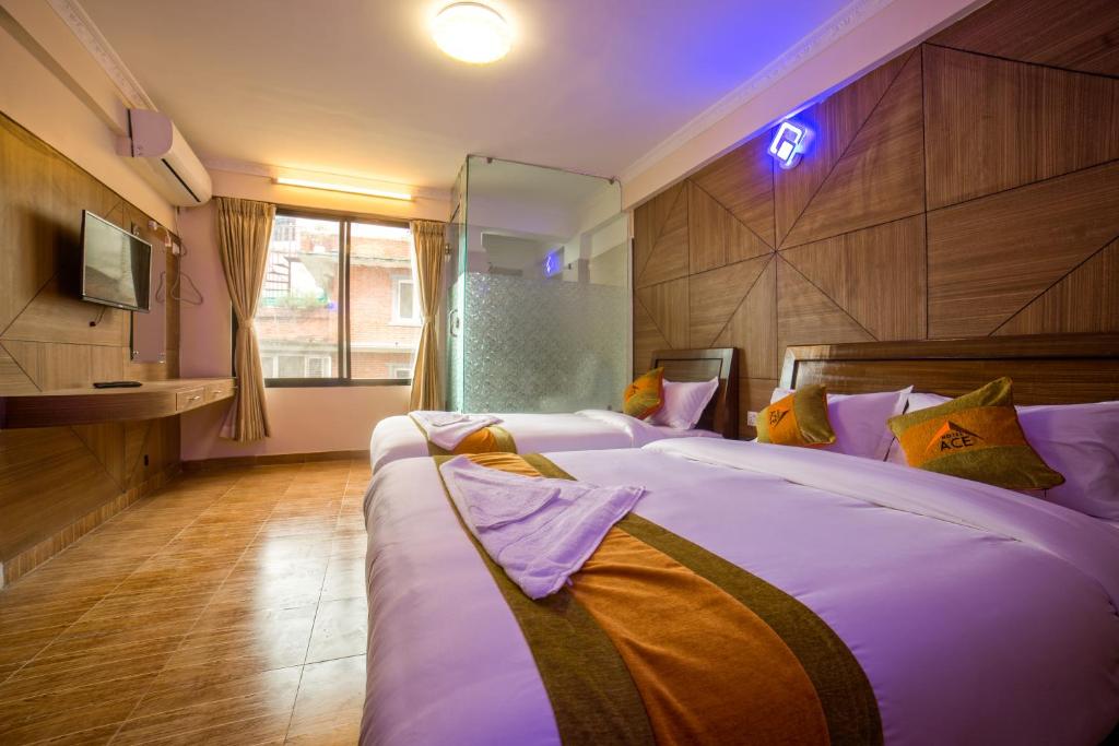 Cama o camas de una habitación en Hotel ACE