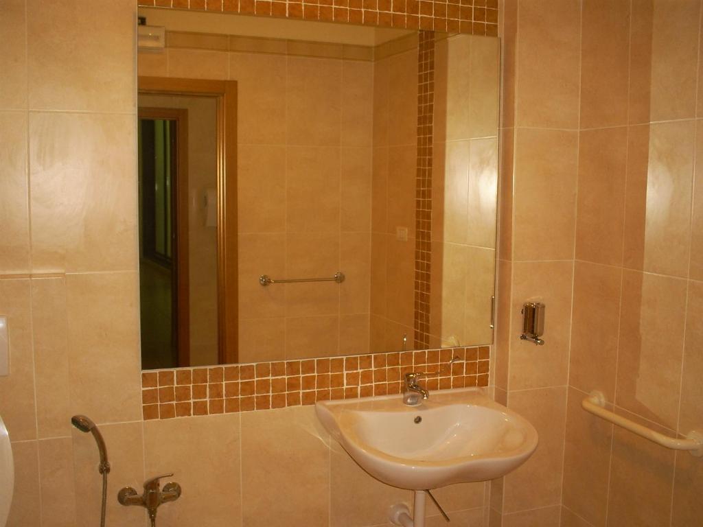 Koupelna v ubytování Hotel Milomax