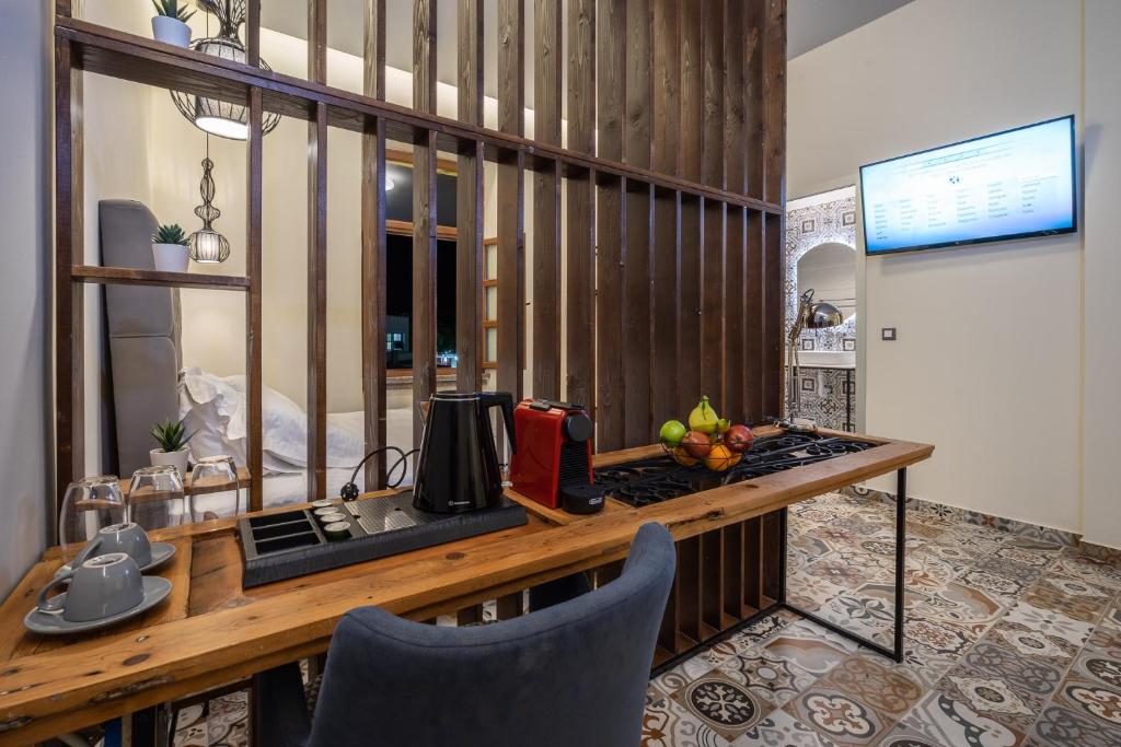 Kuchyň nebo kuchyňský kout v ubytování Casa Poli Suites