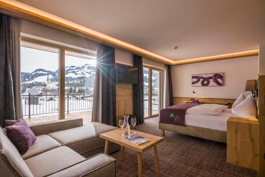 Postel nebo postele na pokoji v ubytování Hotel Zentral ****superior