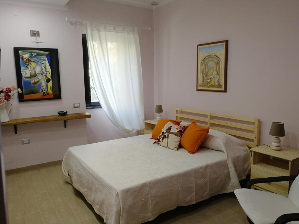 Postel nebo postele na pokoji v ubytování B&B Casa Cirillo and Urban winery
