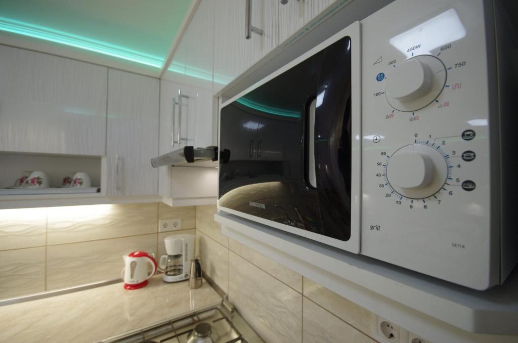 Kuchyňa alebo kuchynka v ubytovaní Amália Apartman