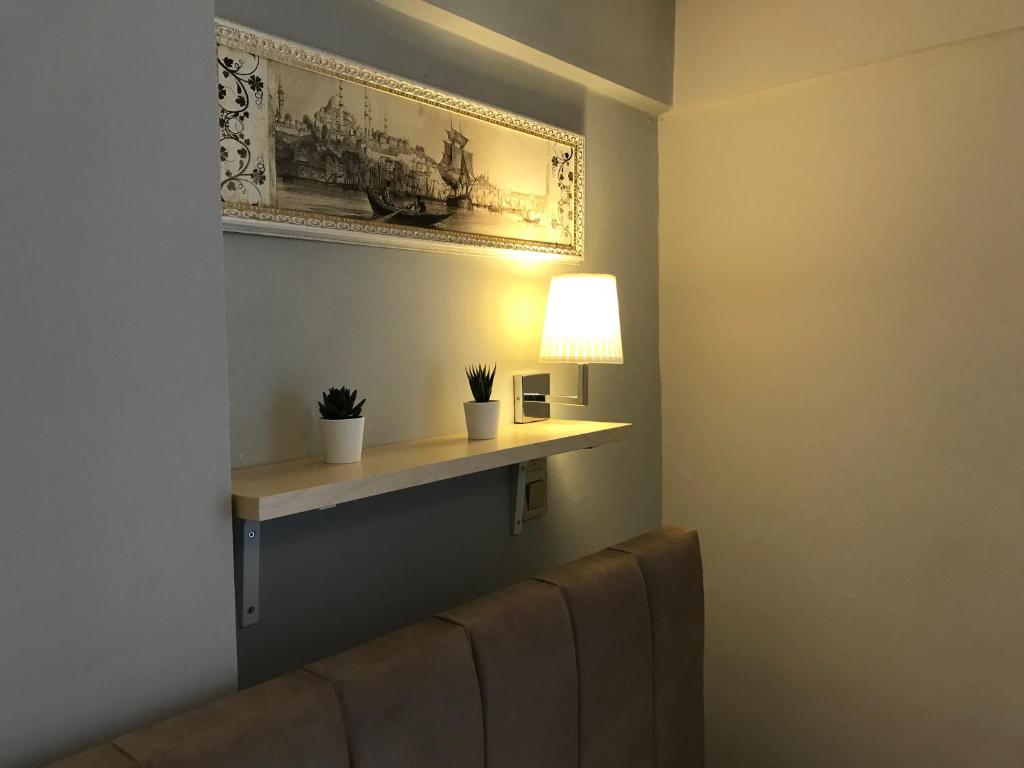 Goji's Apartments - Penthouse Triple Room