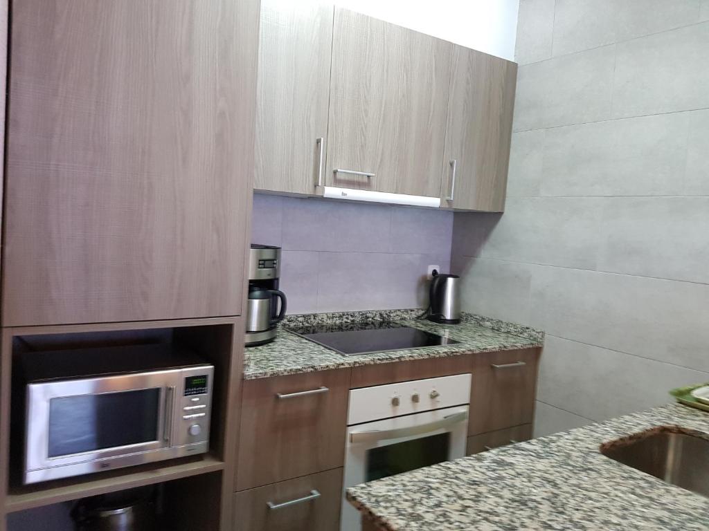 Kuchyň nebo kuchyňský kout v ubytování Apartamentos Grifovacances Canigou