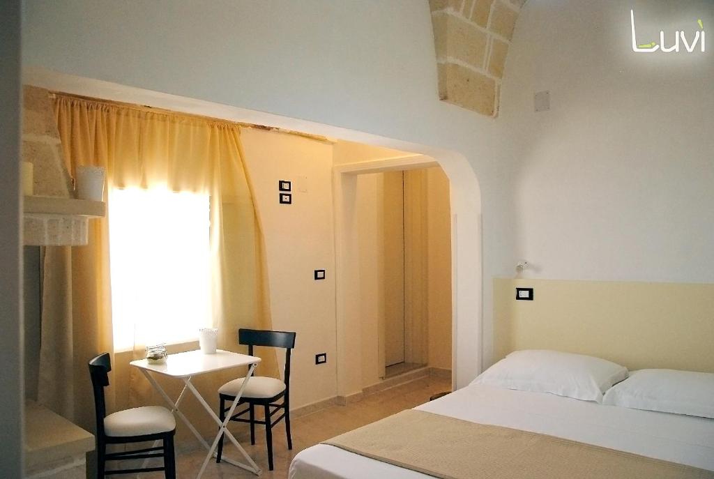 Postel nebo postele na pokoji v ubytování B&B Luvì
