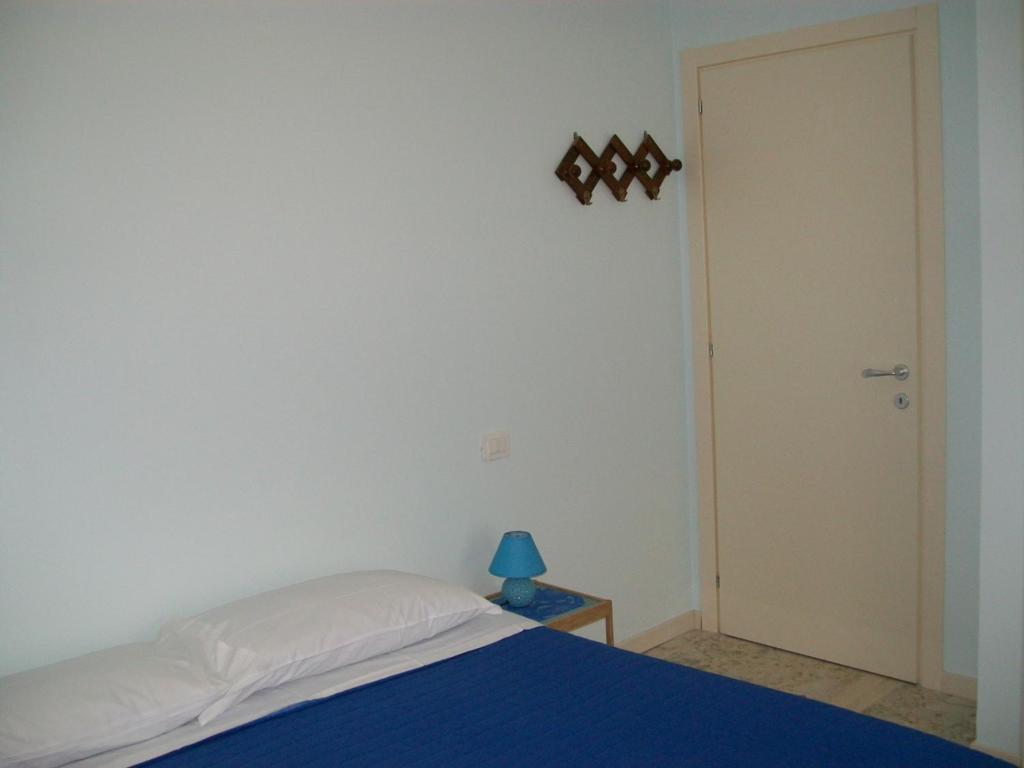 Letto o letti in una camera di Affittacamere il girasole