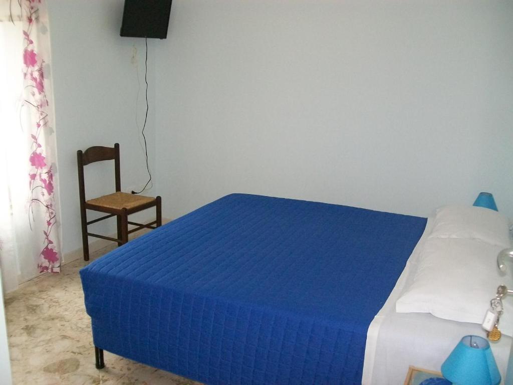 Letto o letti in una camera di Affittacamere il girasole