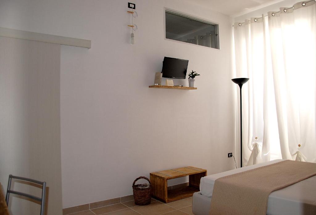 Postel nebo postele na pokoji v ubytování B&B Luvì
