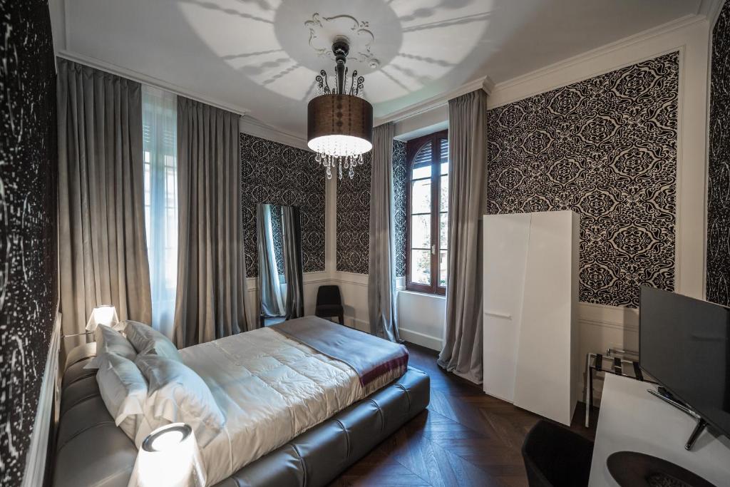 Postel nebo postele na pokoji v ubytování Relais Metelli