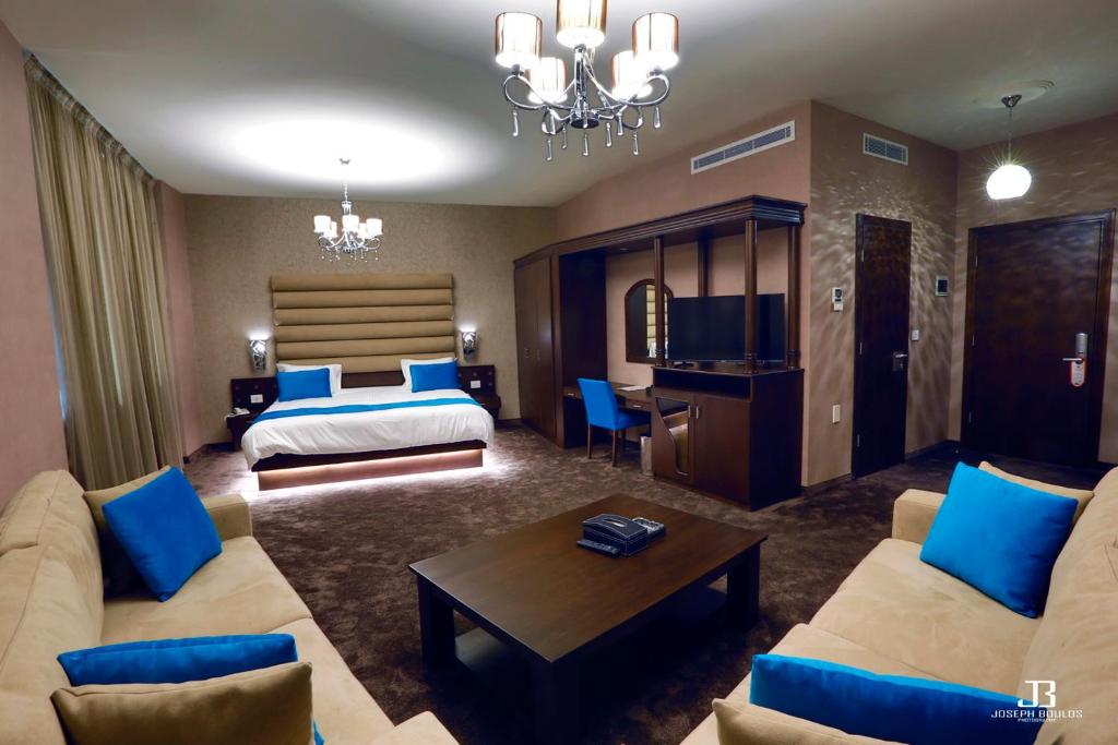 Postel nebo postele na pokoji v ubytování Eden Hotel