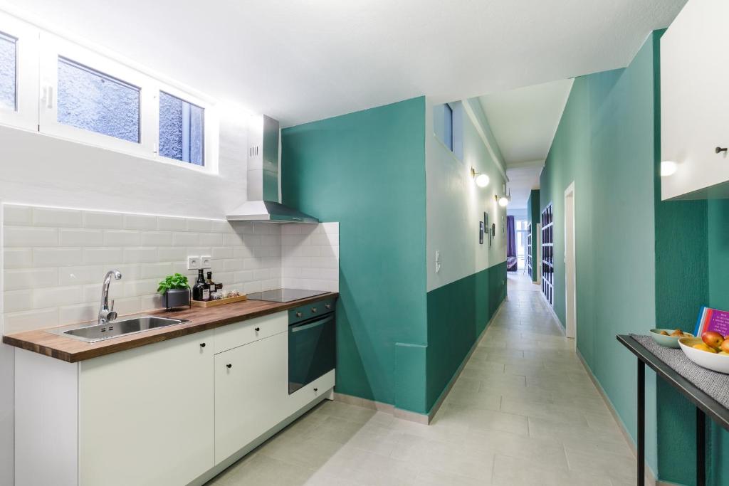 Kuchyň nebo kuchyňský kout v ubytování Boutique Central Apartments Acropolis View