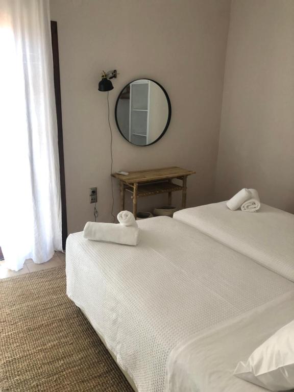 Postel nebo postele na pokoji v ubytování Apartment Sunkiss - Roxan Residence