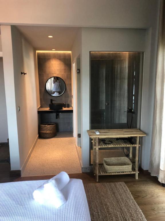 Postel nebo postele na pokoji v ubytování Apartment Sunkiss - Roxan Residence
