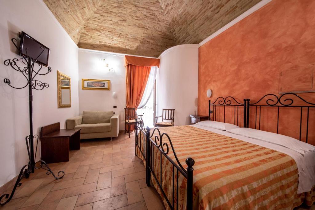 Postel nebo postele na pokoji v ubytování Hotel Sole